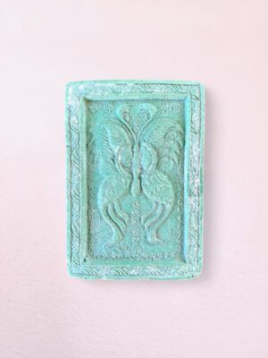 Green Kruba Krissana King of Butterfly Thai Buddhist amulet with intricate yantra design, used for luck, love, and prosperity.