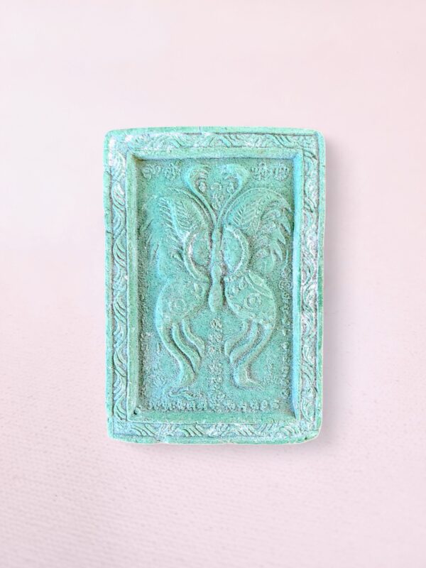 Green Kruba Krissana King of Butterfly Thai Buddhist amulet with intricate yantra design, used for luck, love, and prosperity.