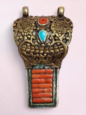 Vintage Tibetan silver necklace pendant with coral, turquoise, amber, and lapis lazuli inlays – handcrafted Himalayan jewelry front view