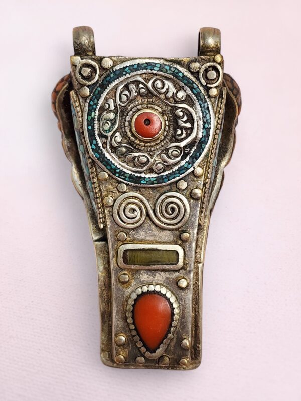 Handcrafted vintage Tibetan silver pendant with coral, amber, turquoise, and lapis lazuli stones – ornate Himalayan jewelry back view