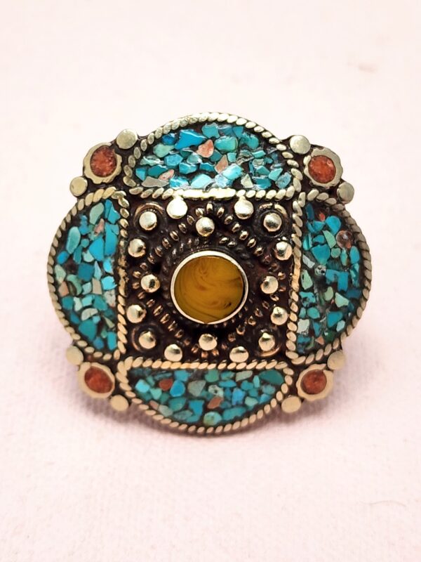 Vintage Tibetan silver ring with turquoise, coral, and amber inlay – handcrafted bohemian statement jewelry front view