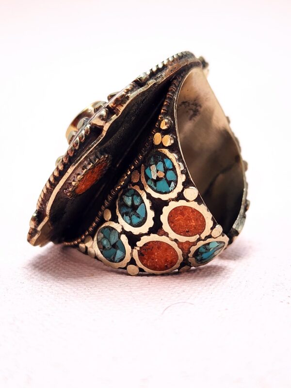 Vintage Tibetan silver ring with turquoise, coral, and amber inlay – handcrafted bohemian statement jewelry side view