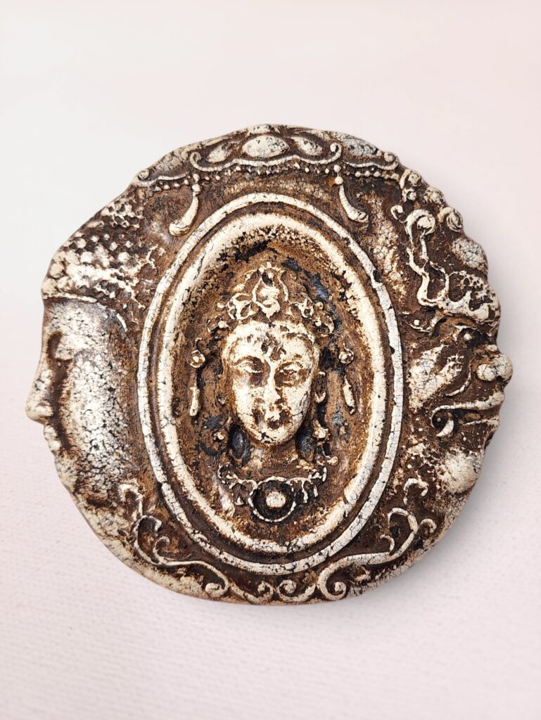 Three-Faced Buddhist Medallion Amulet with Inscribed Script, Found in Thailand